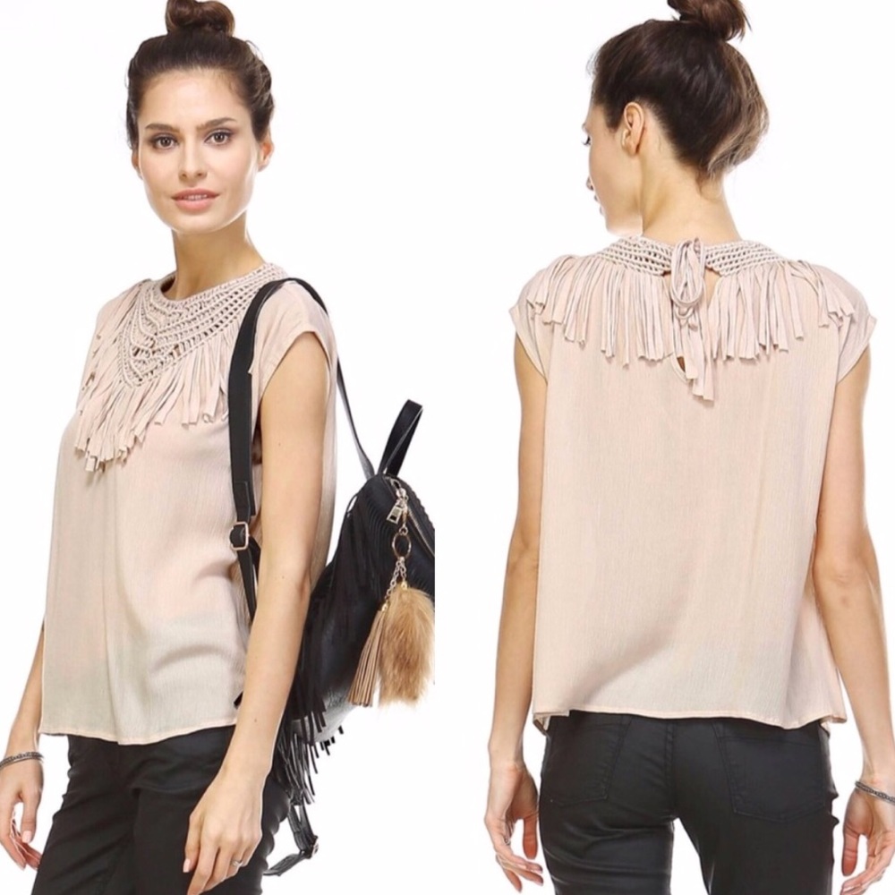 Crew neck, fringed cream top